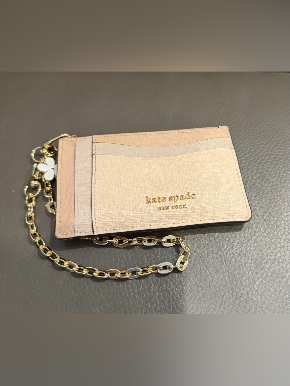 kate spade blush pink card case with gold chain and charm